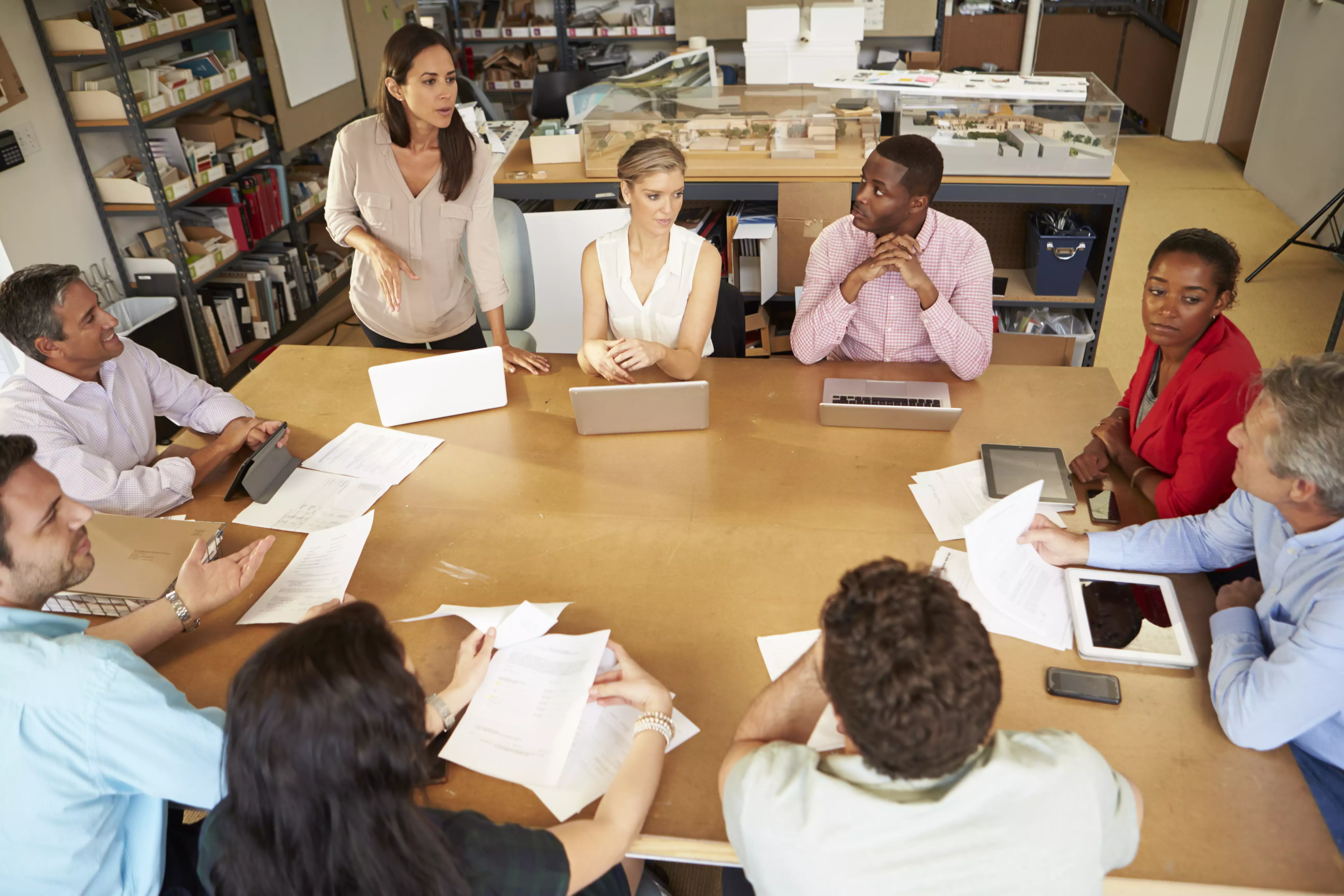 Two South African professionals in a coaching-style leadership development conversation